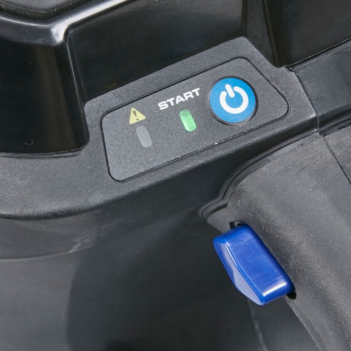 A device with control buttons is displayed. The "START" button is highlighted in green, indicating readiness, surrounded by warning indicators and a blue activation button.