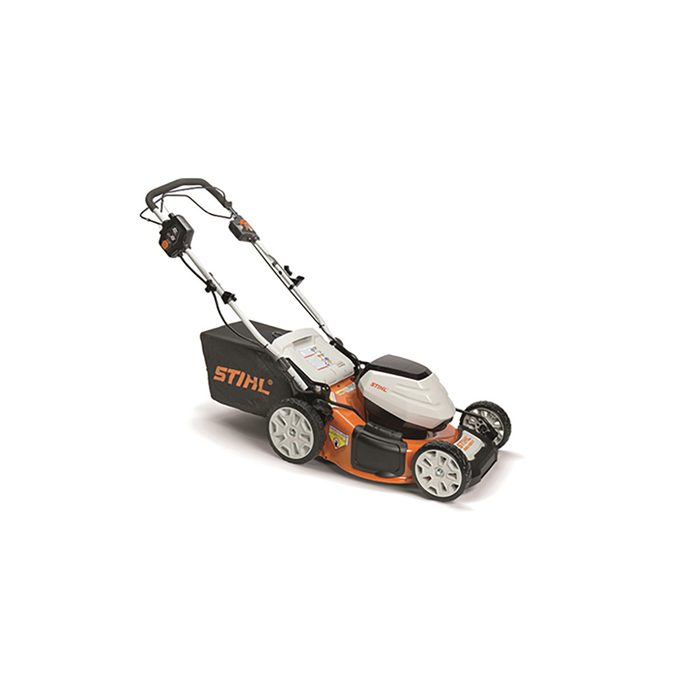 A lawn mower is positioned at an angle, with a bag for grass clippings attached. It's designed for cutting grass efficiently in outdoor spaces.