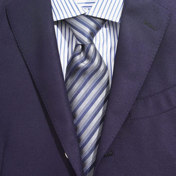 Men's Suit with a White and Blue Striped Dress Shirt, a Blue Striped Tie and a navy blue suit