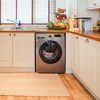 A wide-view shot of a domestic kitchen interior from a residential building in Northeastern England.
